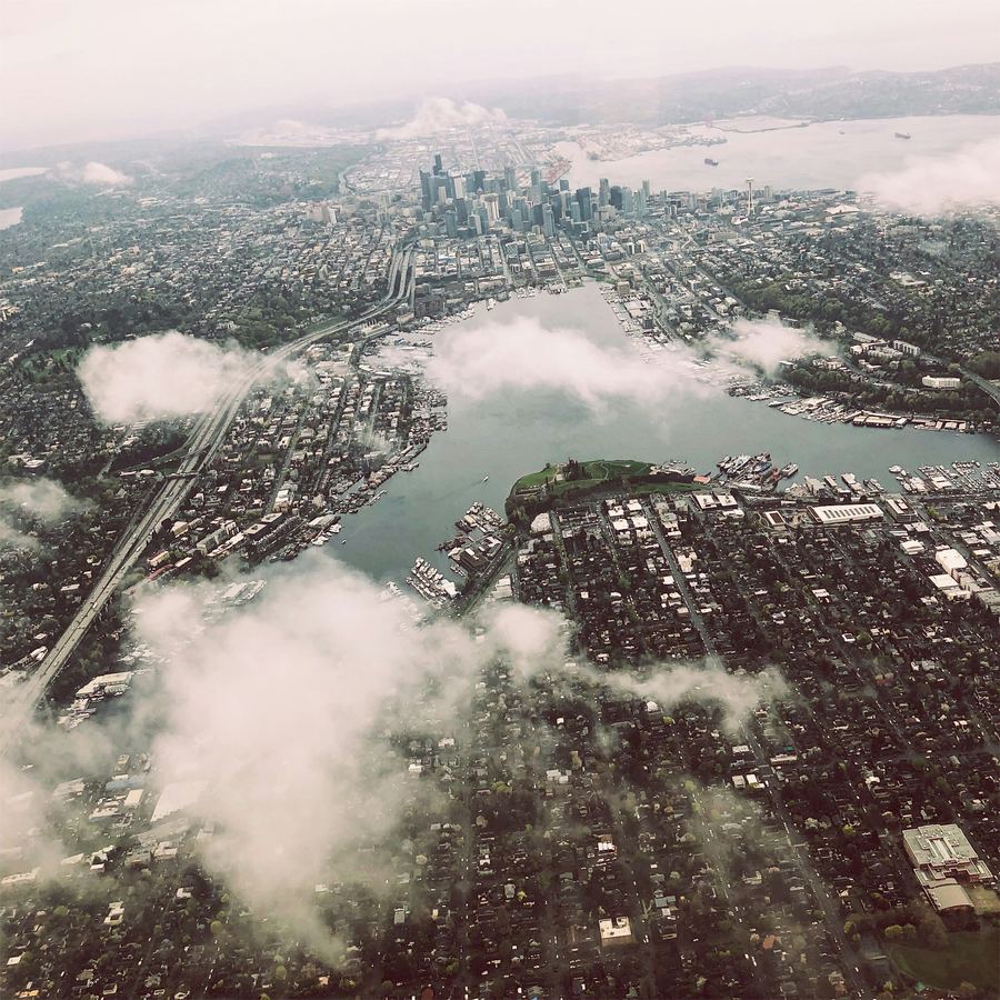 Aerial view of Seattle above the clouds