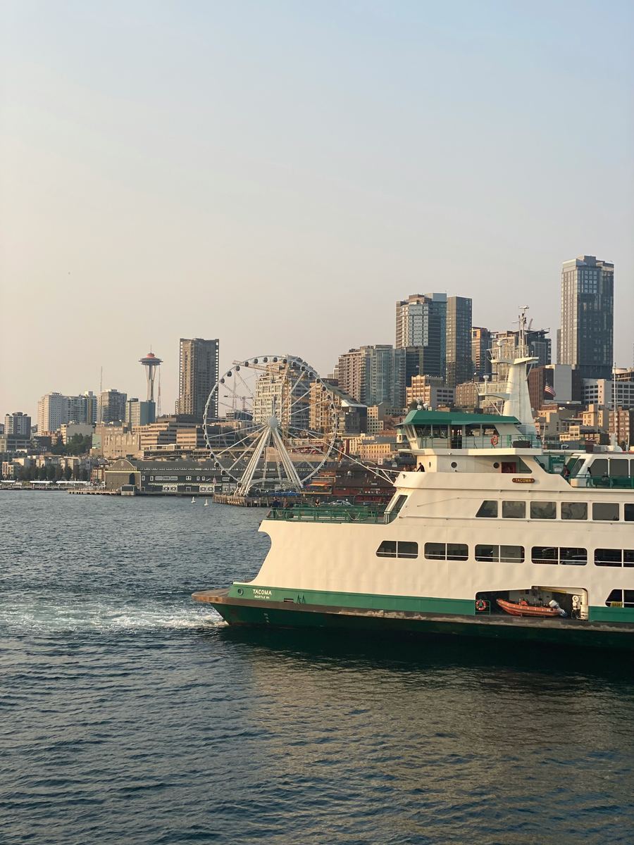 Washington State Ferry crossing Elliott Bay with the Seattle skyline and Space Needle in view